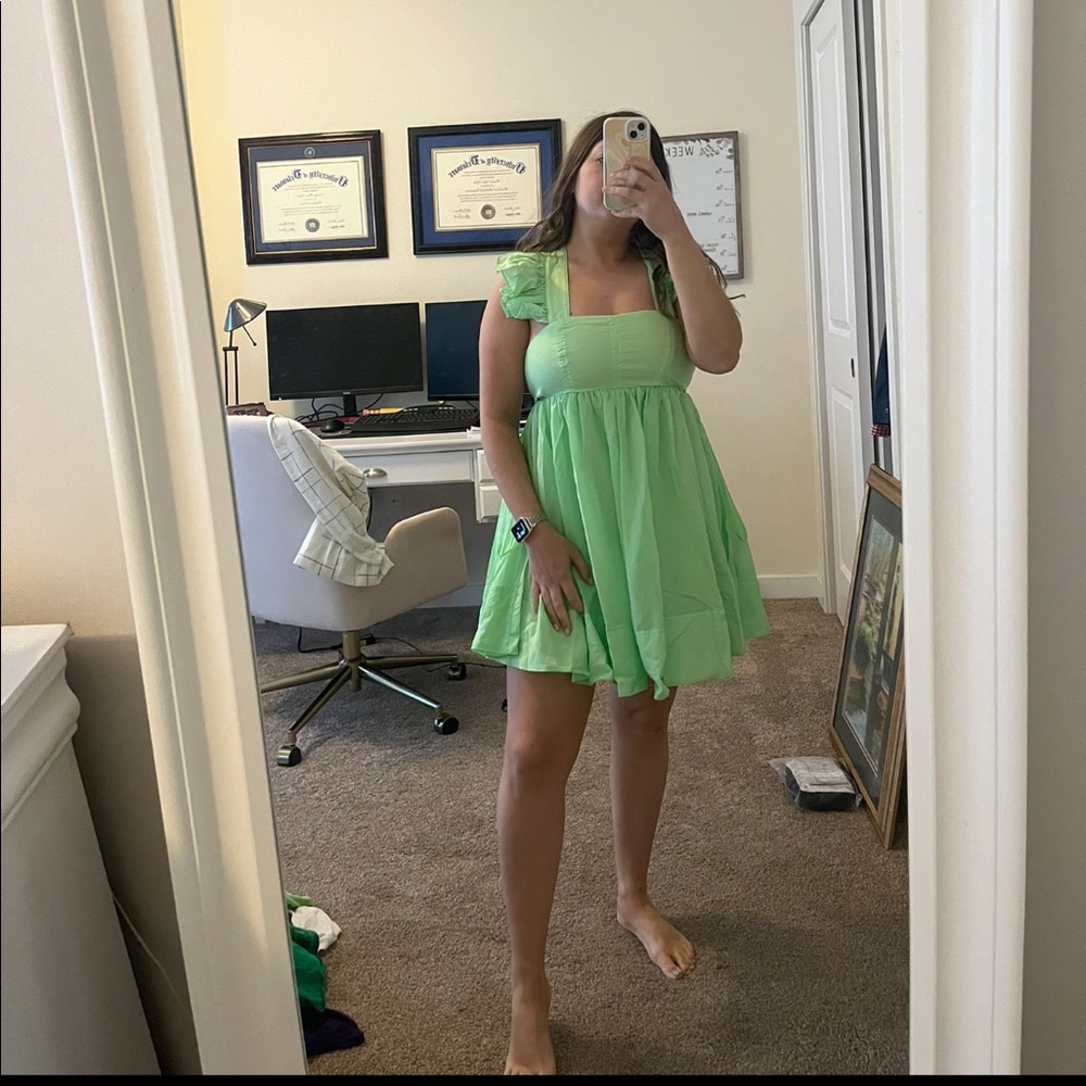 Beautiful bright green dress with ruffle on the sleeves from Talulah. Worn once!
